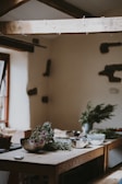 Peaceful kitchen scene featuring simple, clean lines and natural light highlighting fresh herbs.
