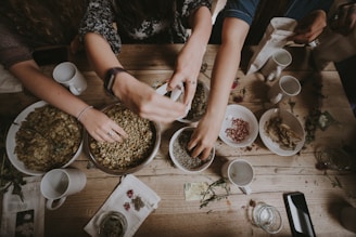 people mixing items on bowl