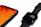 A close-up view of a smartphone and a smartwatch placed on a white surface. The smartphone has a bright orange screen, while the smartwatch displays the time with black and white color tones. Both devices have a sleek, modern design with black exterior finishes.