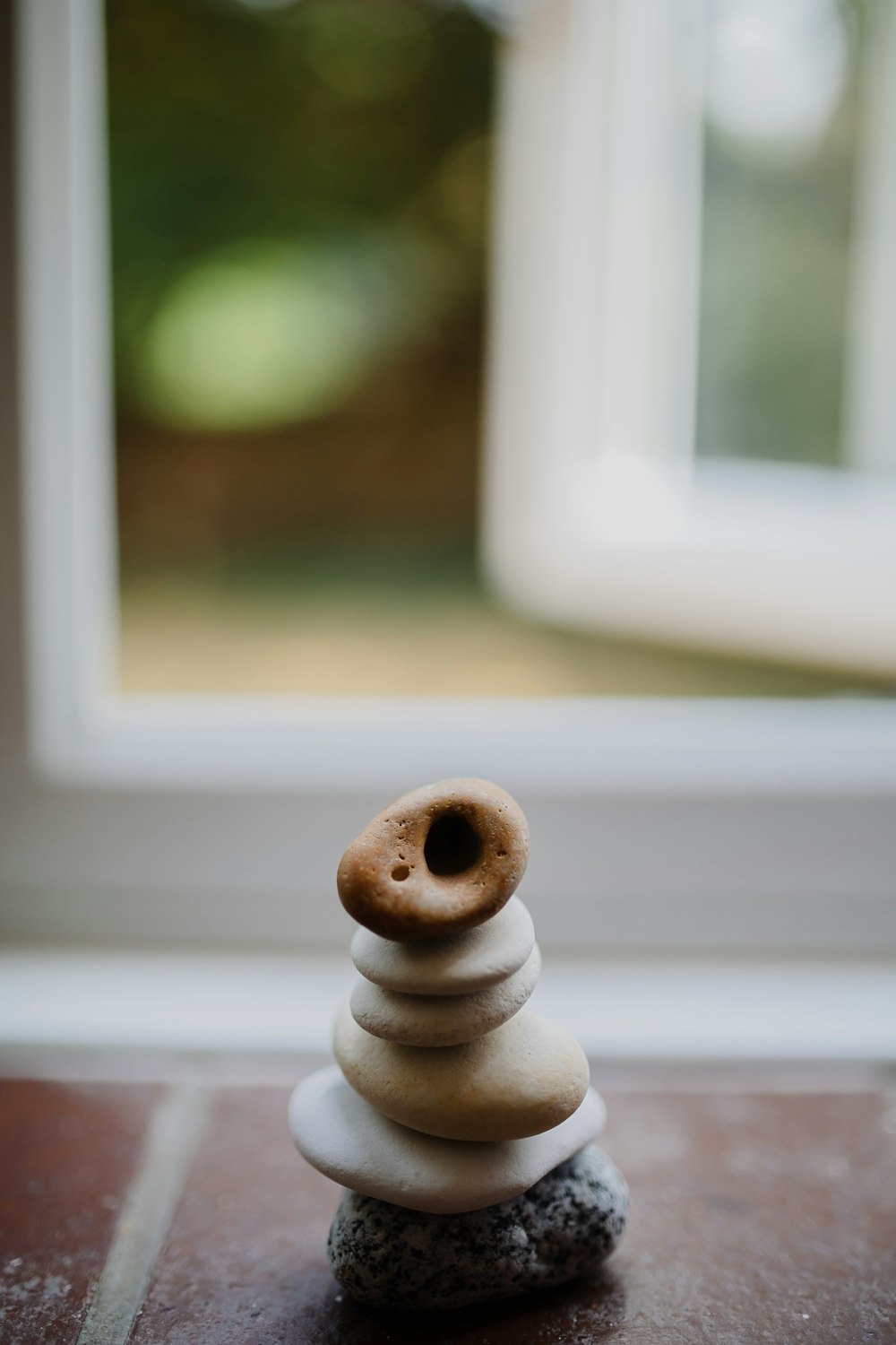 stacked stones in closeup photography