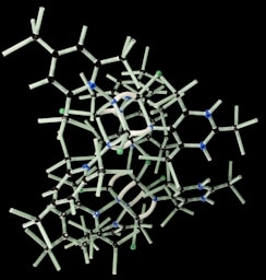 white plastic wire puzzle with black background