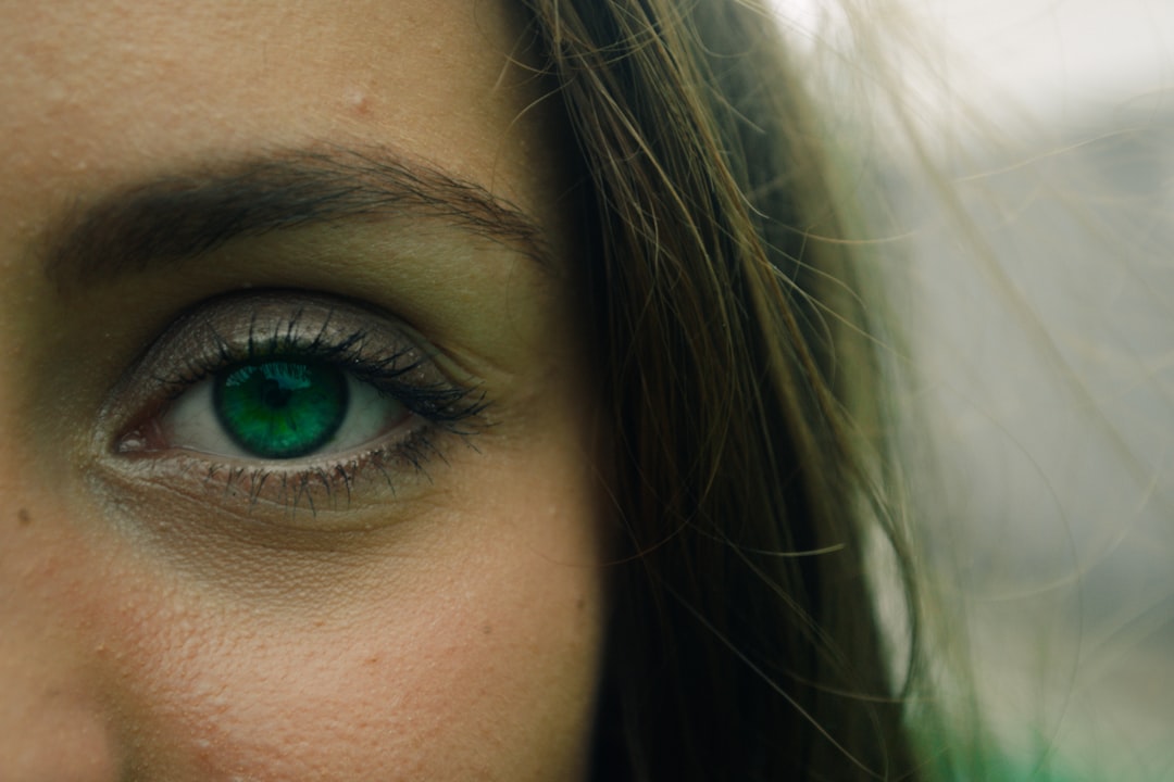 woman showing right eye