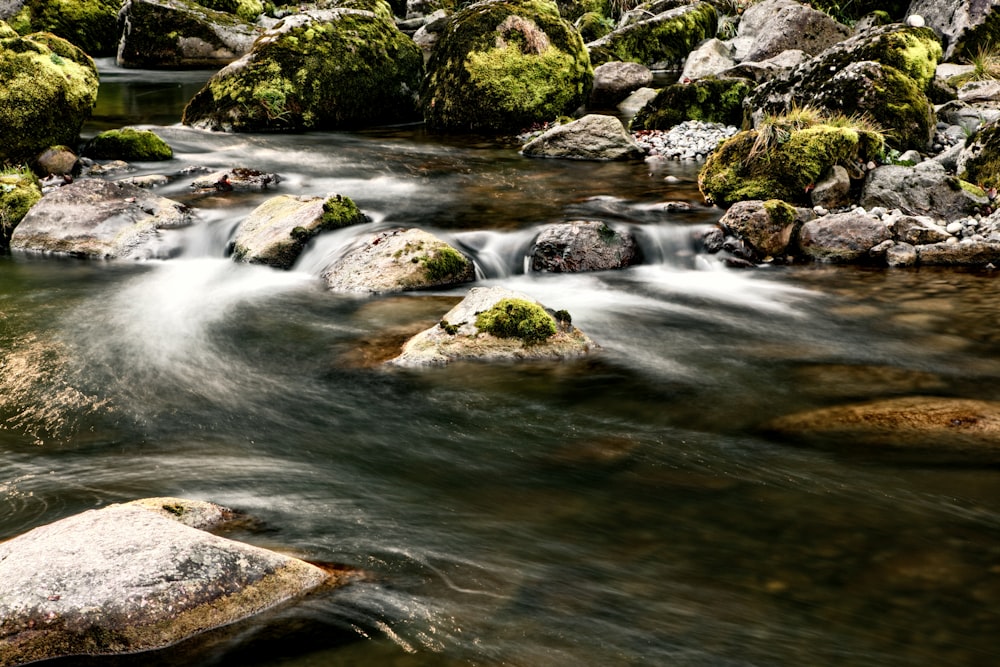 time lapse photography of streaming river