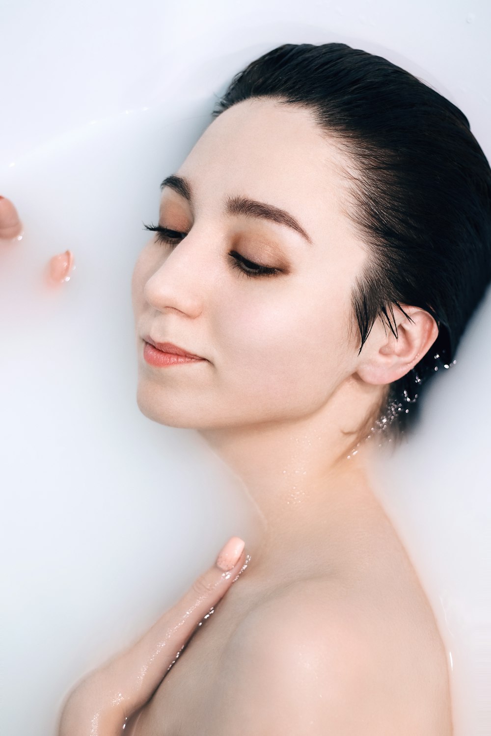 woman bathing in milk