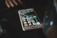 selective focus photography of turned-on gold iPhone 6s