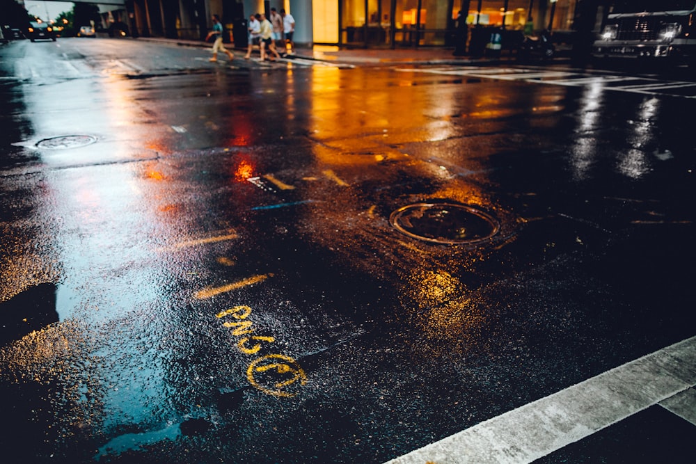 people walking at the pedestrian lane