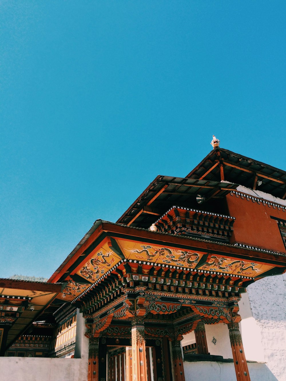 brown and black temple with clear sky