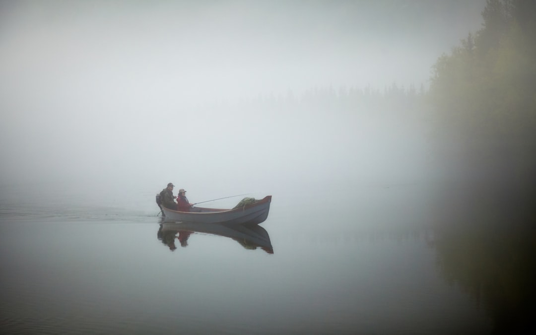 two person fishing on jon boat, Misty River Fishing