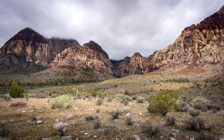 Red Rock Canyon sandstone cliffs on the western edge of the Las Vegas valley under cloudy skies