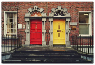 two yellow and red wooden doors