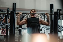 man lifting barbell