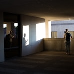 man standing on concrete flooring