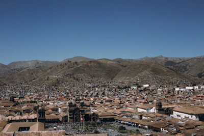 A panoramic view of Mendoza city highlighting local businesses supported by Cantera Roja.