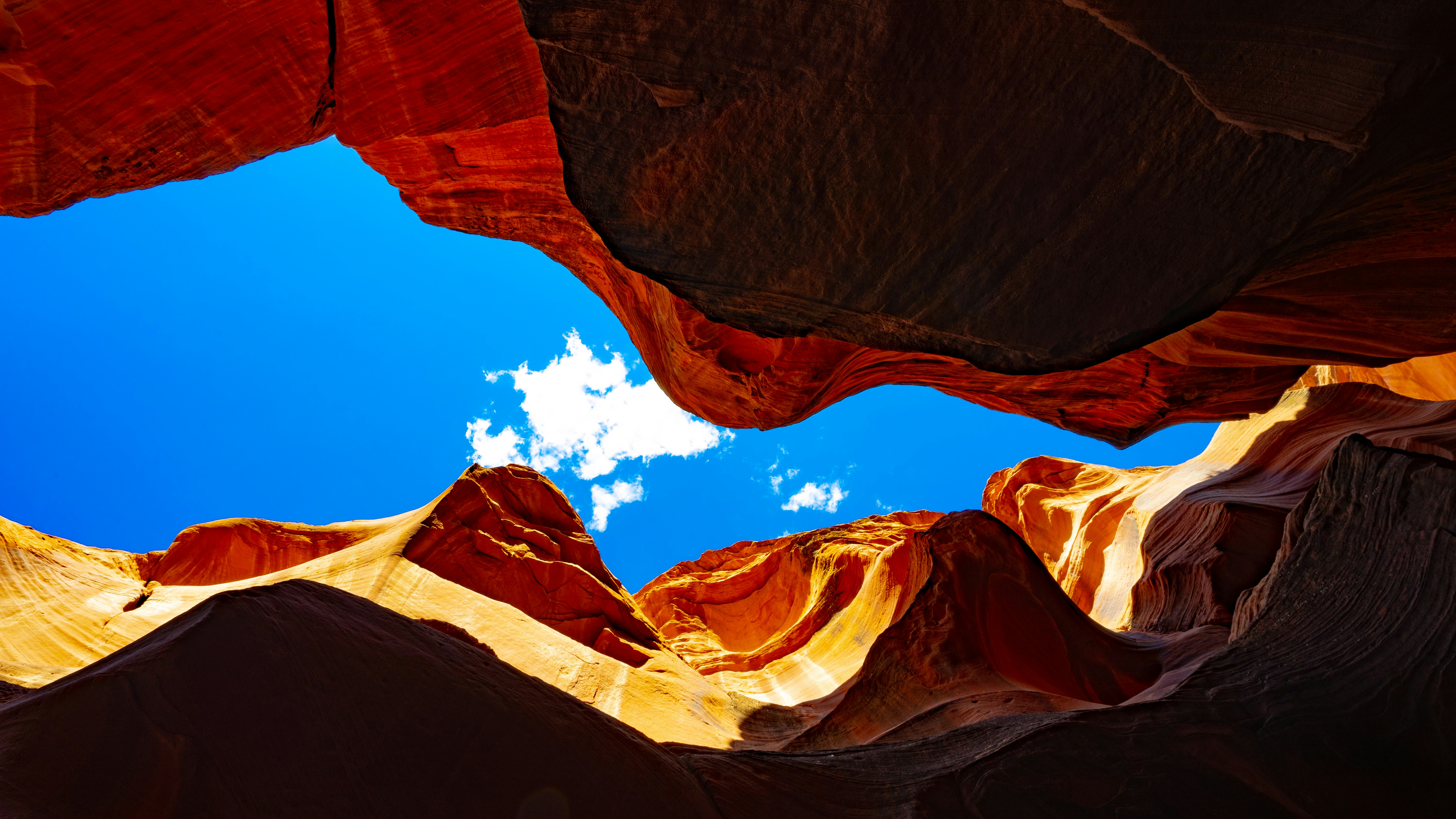 I was completely lost in the beauty of Antelope Canyon and only looking in front of me until we were almost done and took a look up and say bright blue sky. I am glad I didn’t miss all of it.