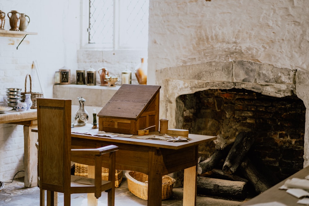 brown wooden miniature house on brown wooden table