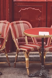red chairs near table