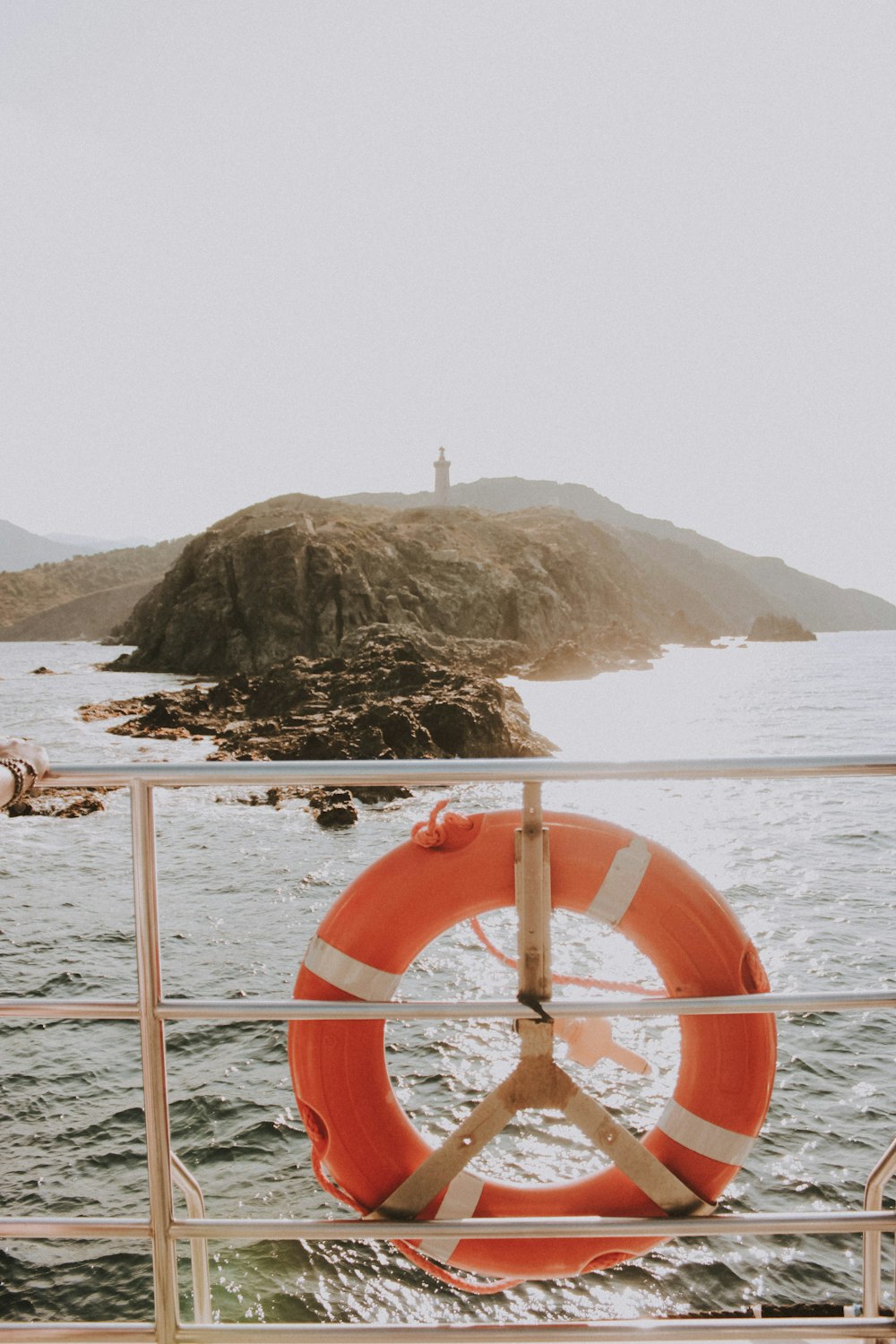 orange buoy on ship