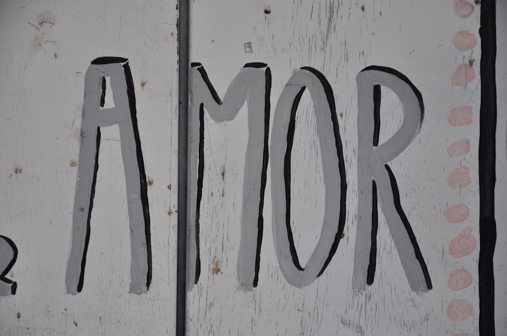 Amor-printed white wood surface