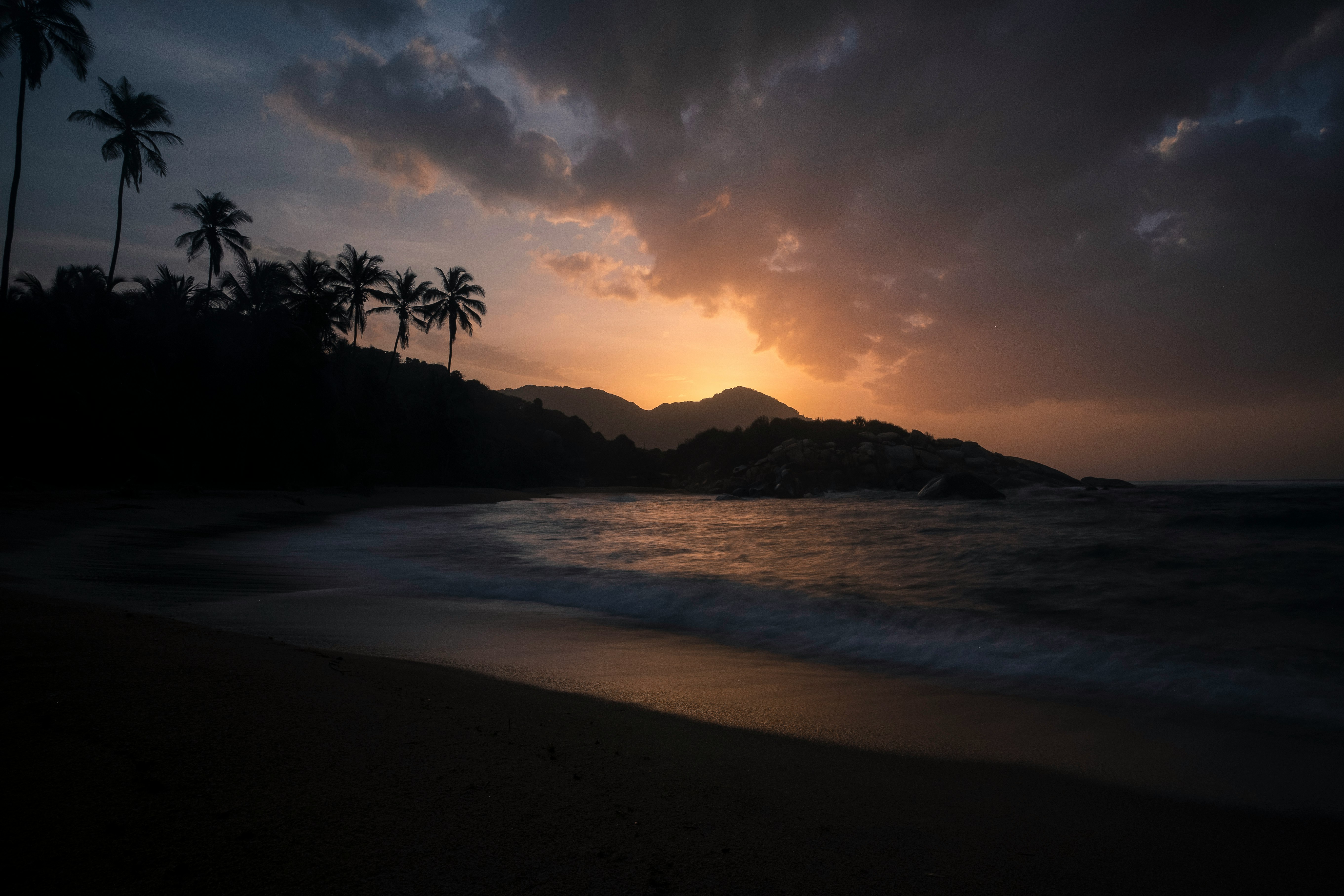 landscape photo of seashore at sunset