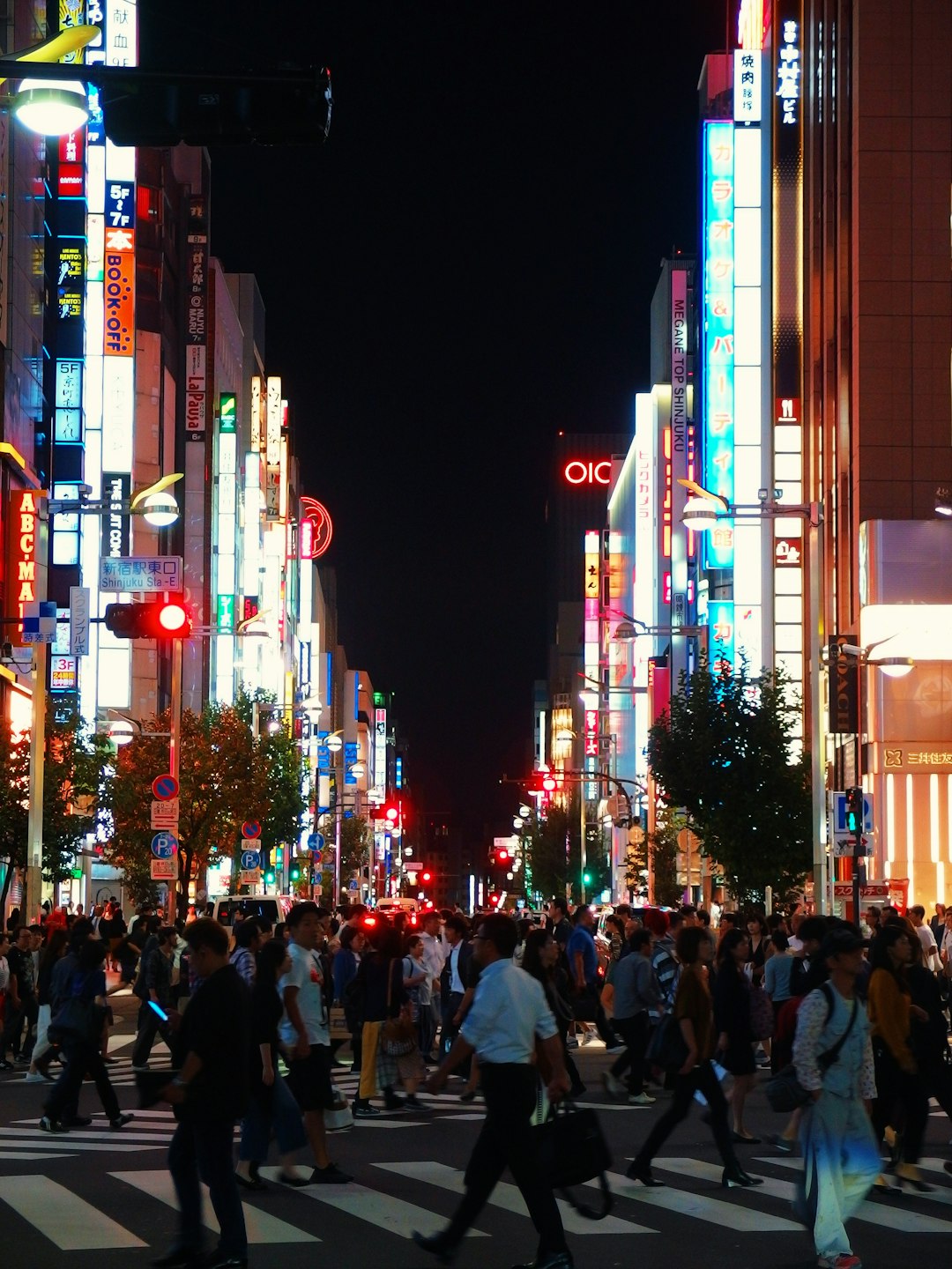 group of people crossing pedestrian lane