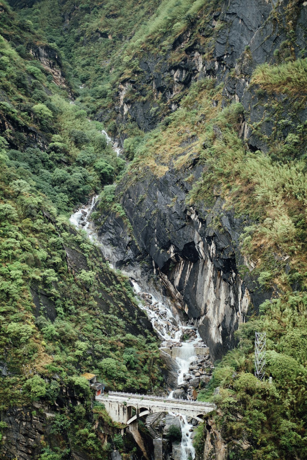 green and gray mountain with river