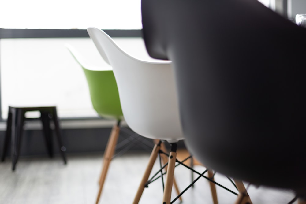 three chairs on wooden flooring