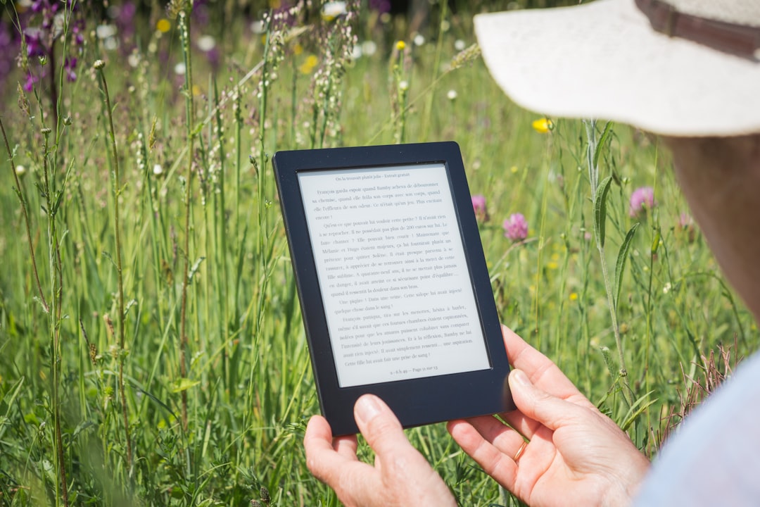 man reading on tablet computer, Spring reading