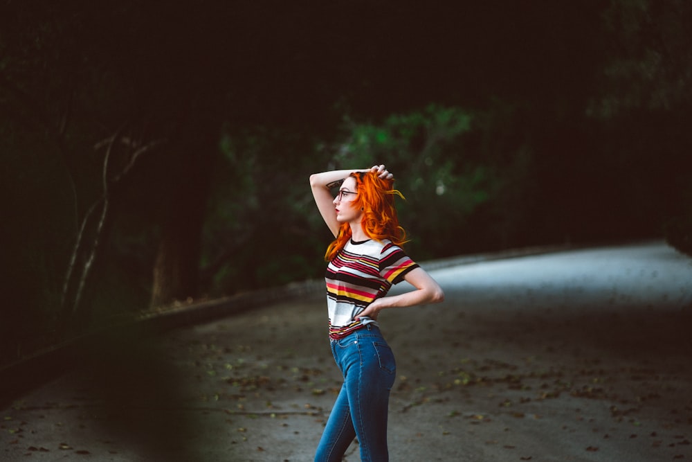 woman standing on the road