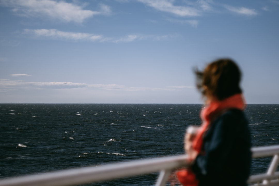 person looking on body of water, a very windy day on the ferry to Vancouver Island.