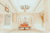 Elegant salon interior shot highlighting the red ceiling and boutique lamps.