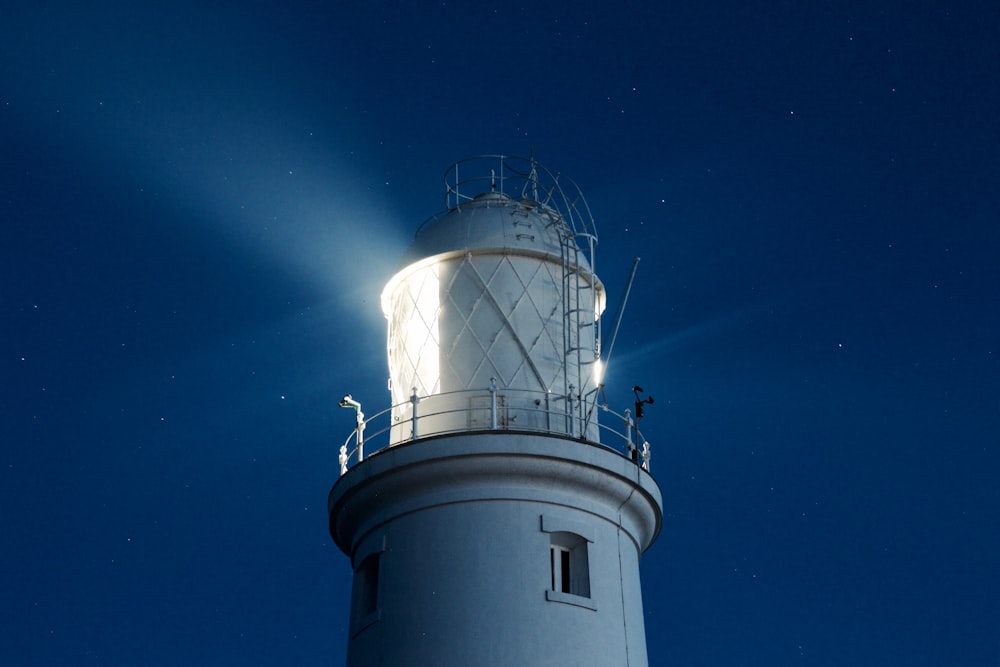 lighthouse during nighttime