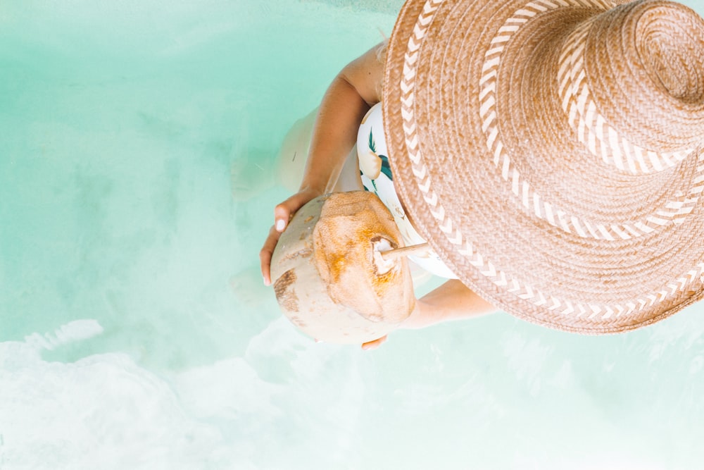 person holding coconut