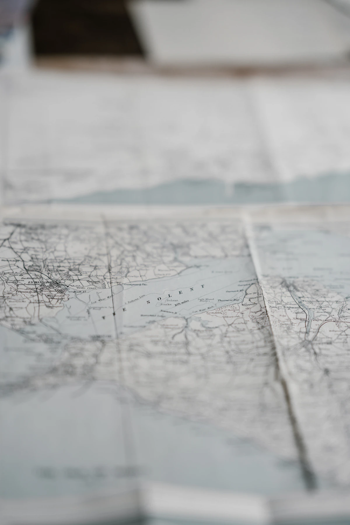 Travel planning maps and notes on a table