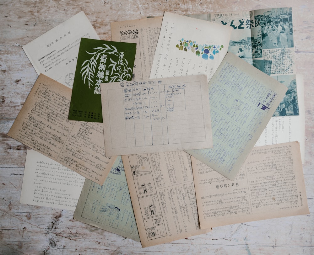 handwritten letters on gray wooden surface