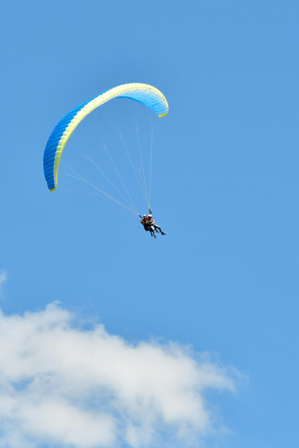person riding on parachute