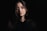 woman in black V-neck shirt