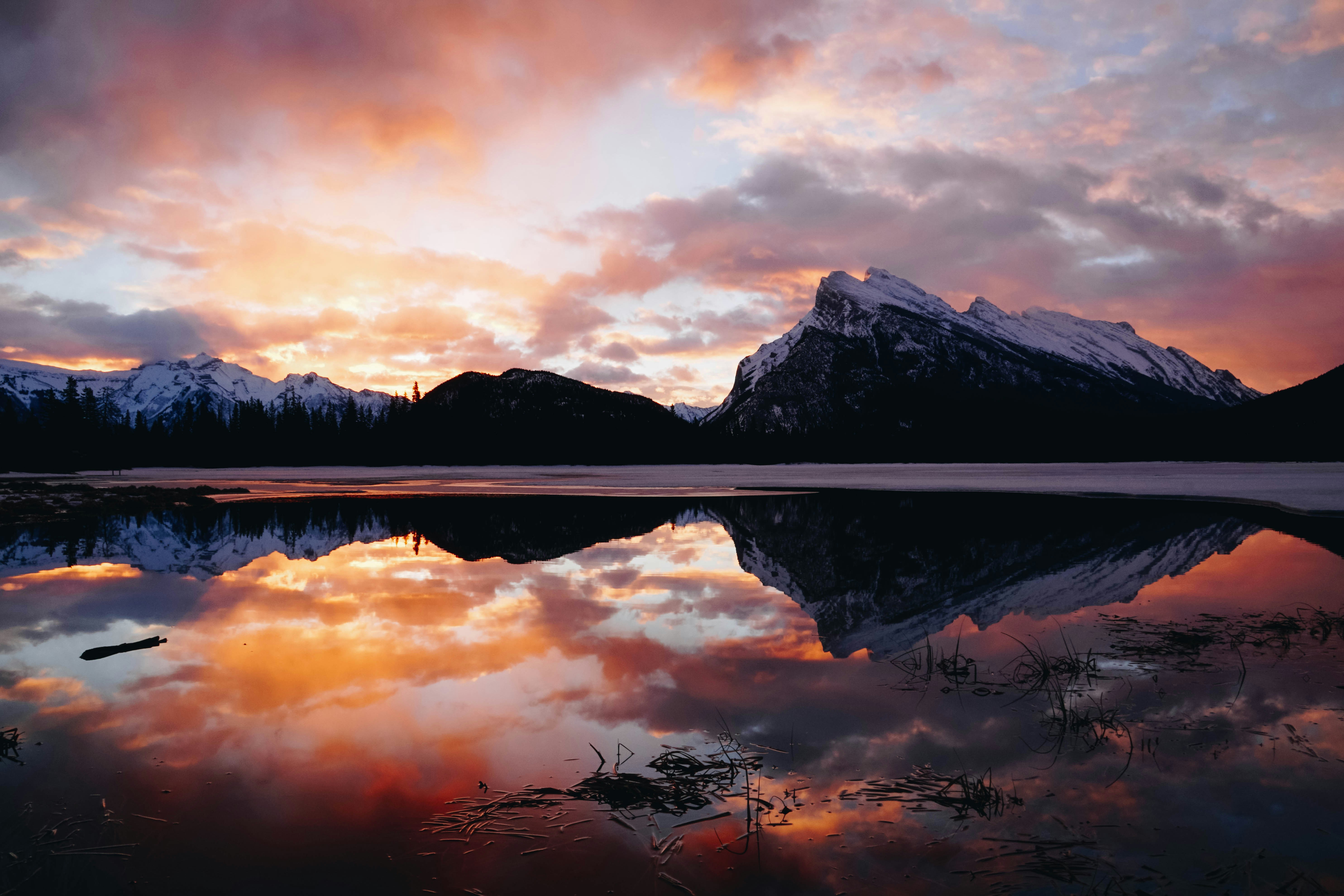 body of water in front of mountain ranges, Rundle Reflection