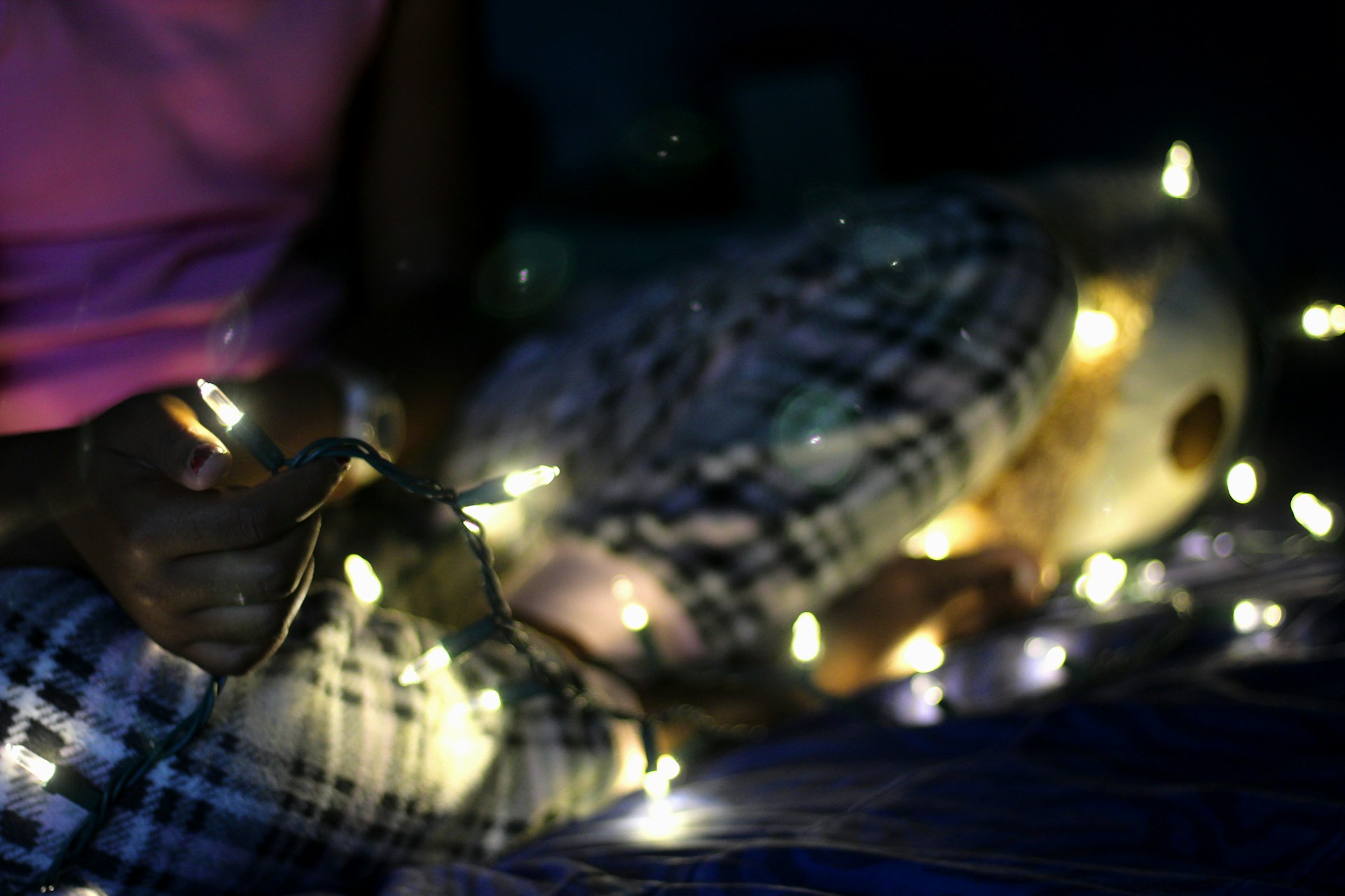 person wearing grey knit sweater