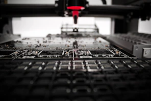 A modern robotic arm assembling electronic components in a bright lab.