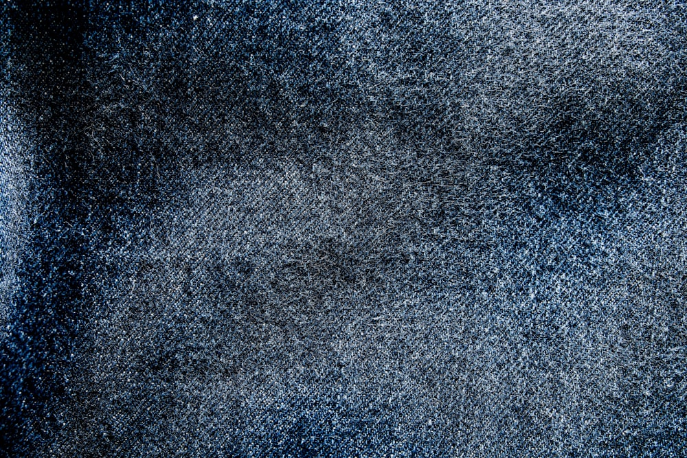 a close up of a blue area rug