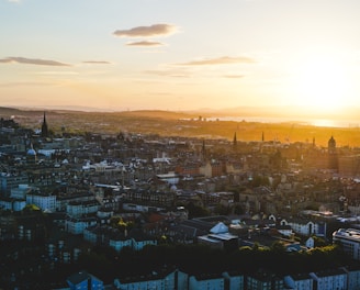 aerial photography of city buildings during sunset