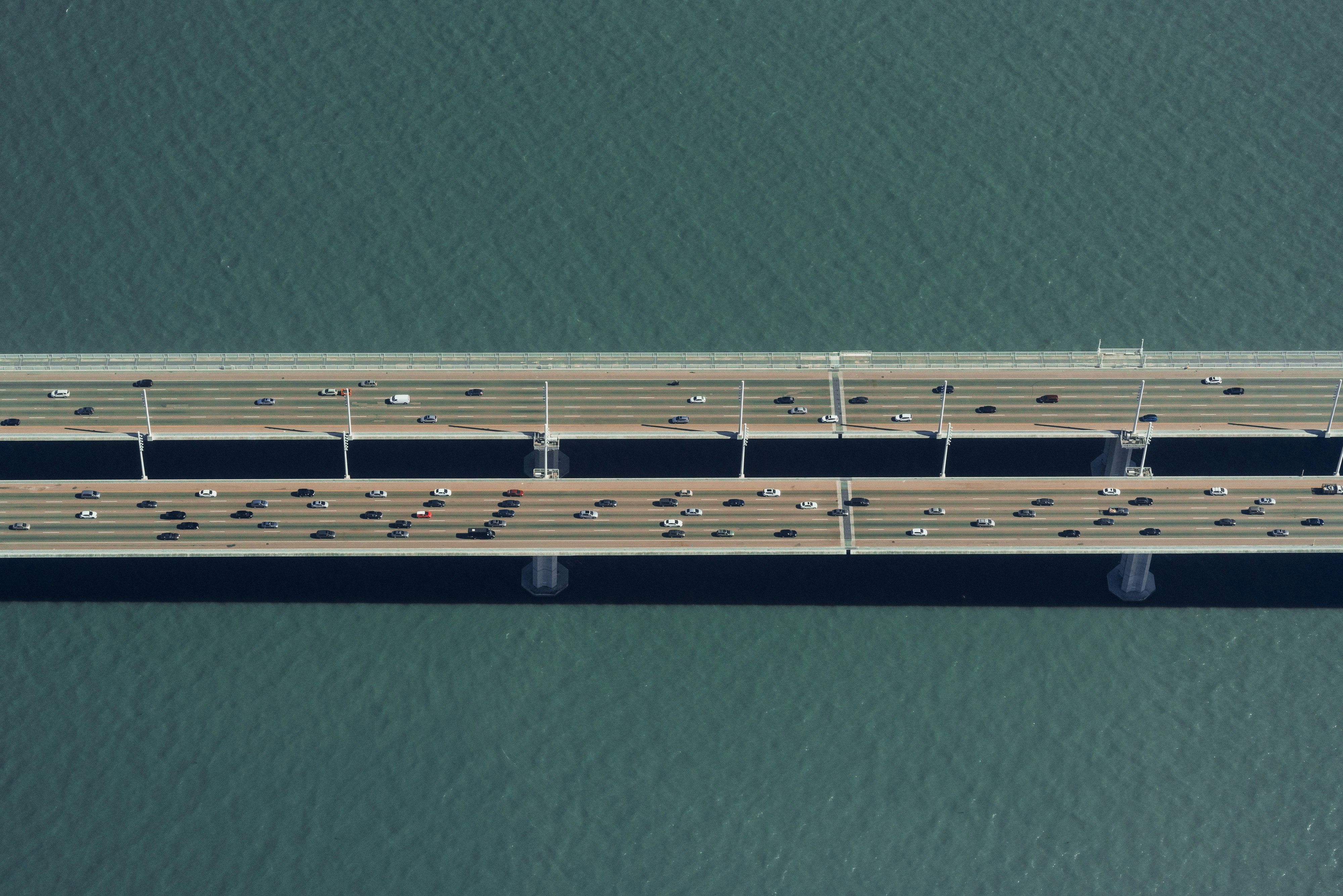aerial view of cars on bridge