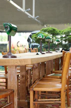 A warm, inviting table set with chairs, symbolizing community and welcome.