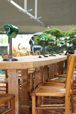 A warm, inviting table set with chairs, symbolizing community and welcome.