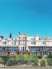 A charming row of traditional Manchester terraced houses on a sunny day