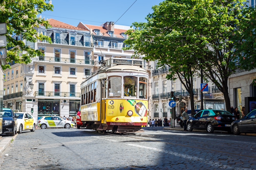 yellow train near the road