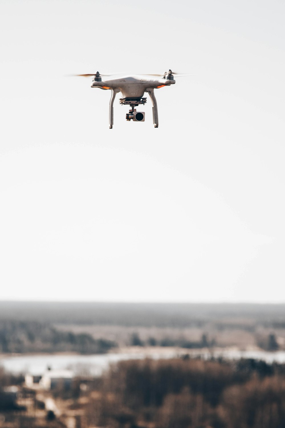 shallow focus photo of gray drone camera