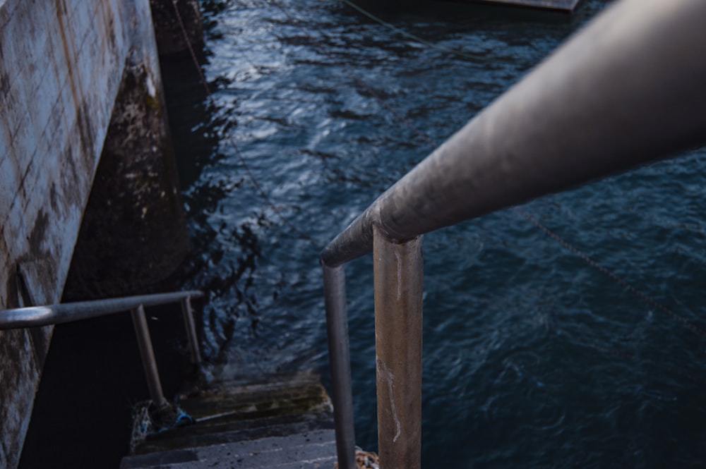 empty stairs down to body of water