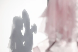 Soft-focus image of a couple embracing, hopeful and connected during treatment.