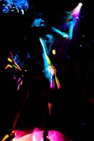 A dynamic shot of a professional stripper performing at a lively bachelor party in Philadelphia.